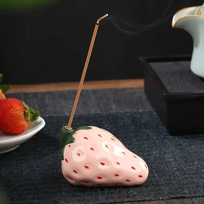 Porcelain strawberry-shaped incense holder with a soothing and calming design for aromatherapy and home decor