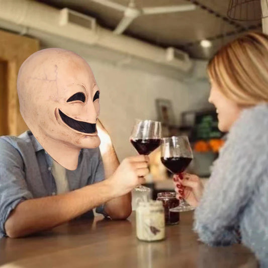 A high-quality latex alien mask with a smiling expression and faceless design, perfect for Halloween or costume parties.