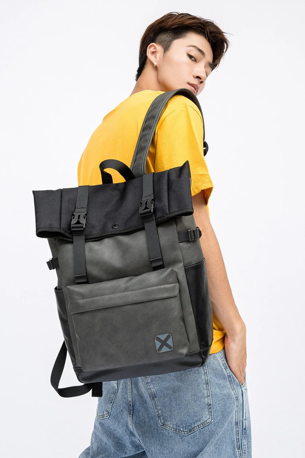 A large, high-quality PU leather backpack with a sleek, modern design and ample storage capacity