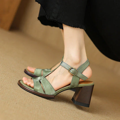 Genuine leather gladiator sandals with chunky heel, open-toe design, and secure buckle strap closure for summer style