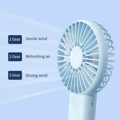 Compact USB Rechargeable Mini Handheld Fan with 3 wind modes, desktop stand, and phone holder for cooling anywhere