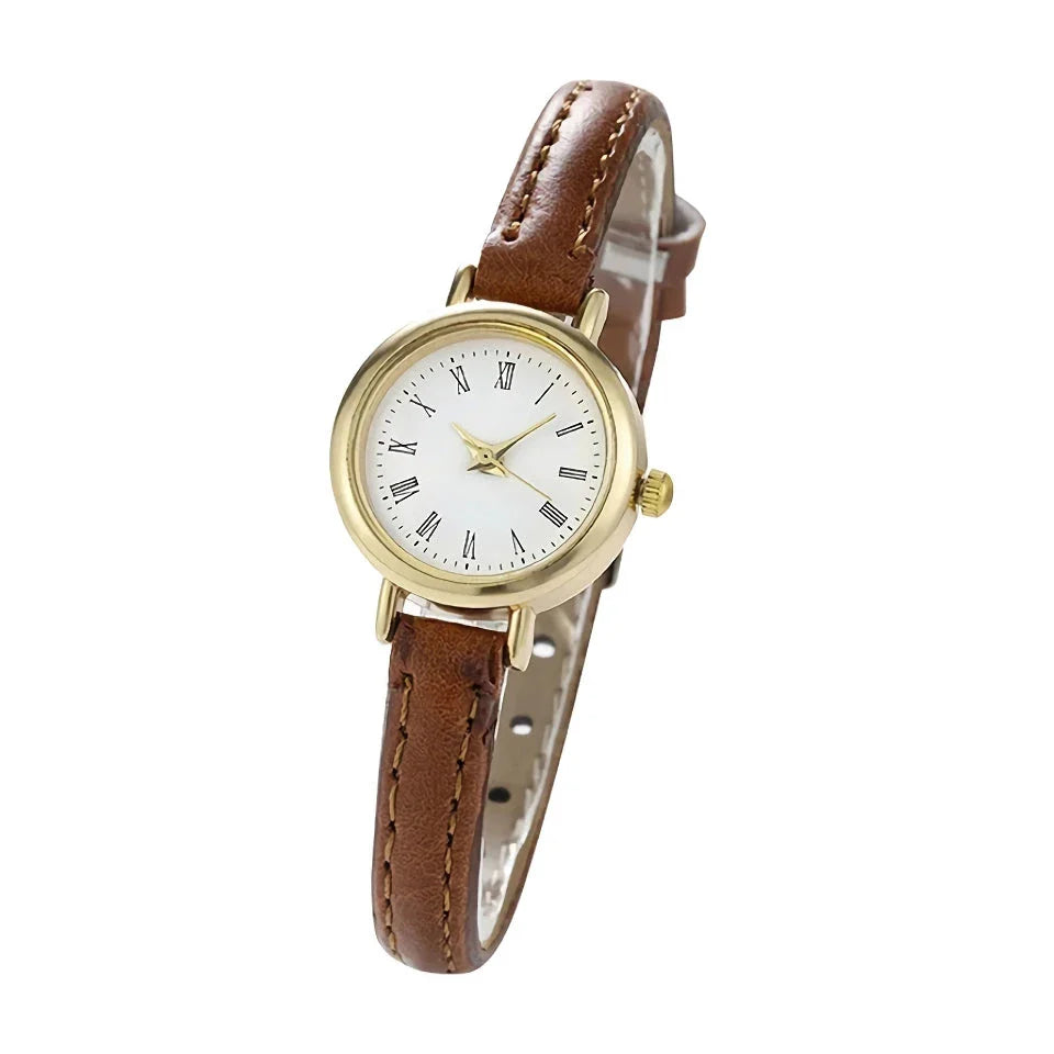 Elegant women's quartz leather wristwatch with a minimalist, timeless design