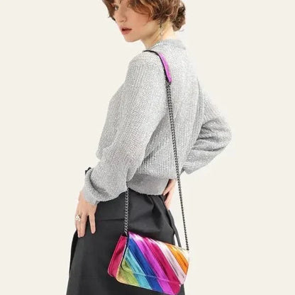 Colorful striped flap handbag with metal chain, a stylish and versatile fashion accessory made from high-quality vegan leather