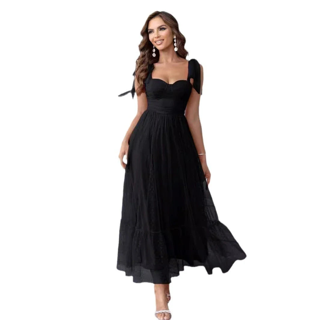Fairy-inspired dress with mid-length silhouette, lace-up details, and luxurious polyester fabric
