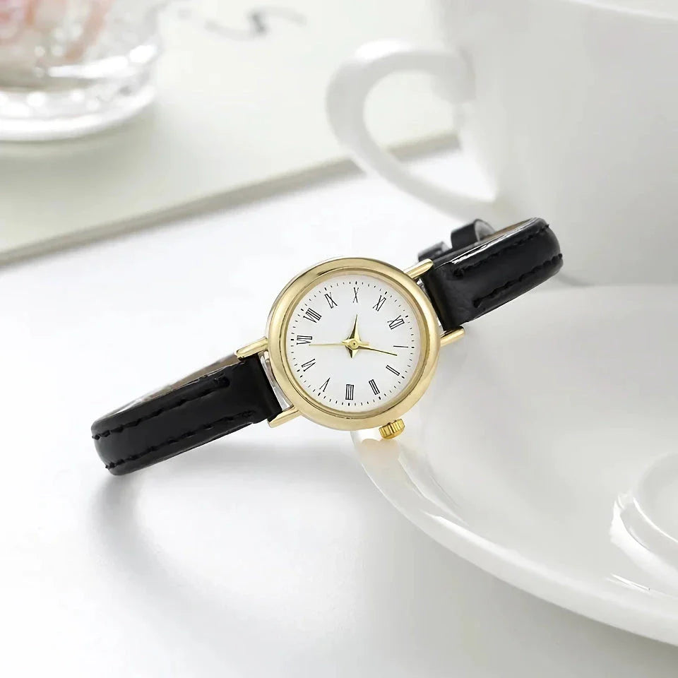 Elegant women's quartz leather wristwatch with a minimalist, timeless design