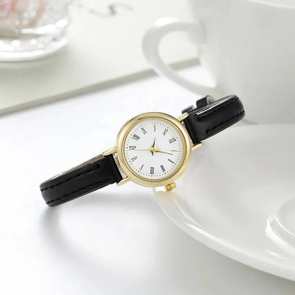 Elegant women's quartz leather wristwatch with a minimalist, timeless design