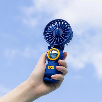 A compact, portable USB-rechargeable hand fan with three speed settings for efficient and quiet cooling.