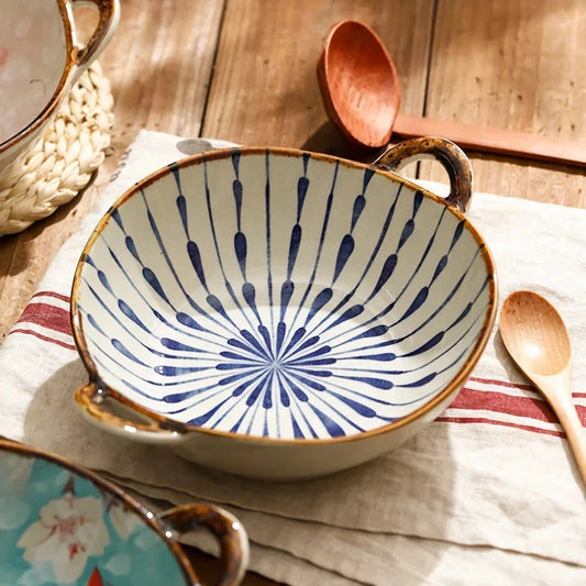Elegant porcelain noodle and soup bowl with a comfortable handle, perfect for serving a variety of hot and cold dishes.