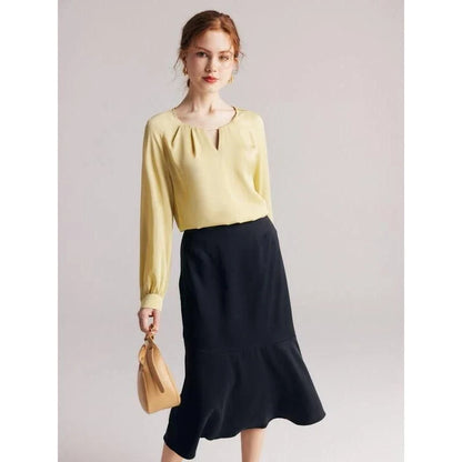 Elegant silk blend raglan sleeve blouse with timeless design and flattering fit for modern women