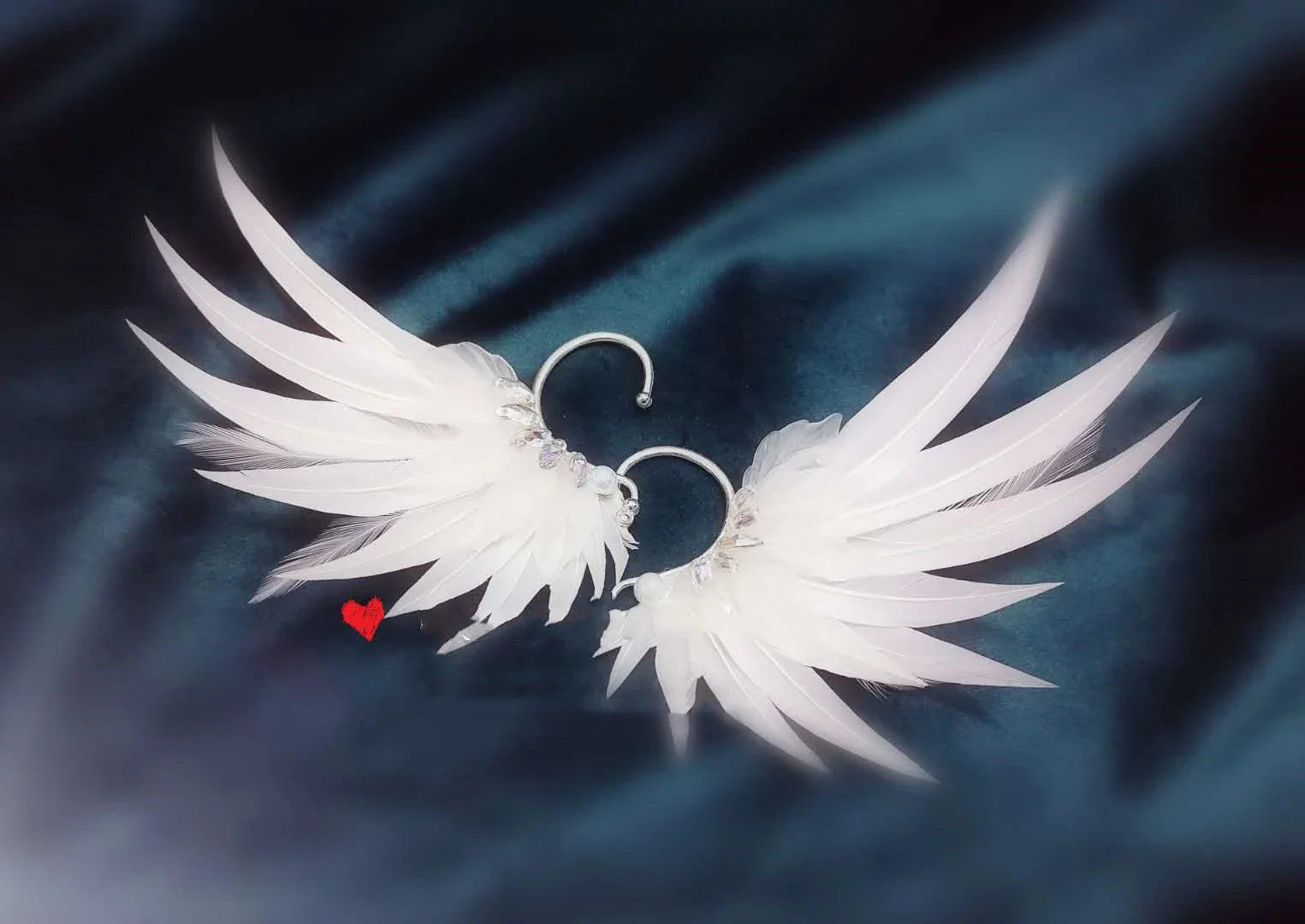 Elegant feather earrings with delicate angel wing design in various color options