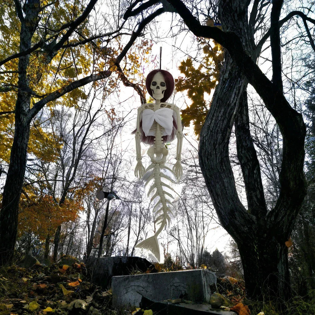 Mermaid bone pendant in various colors, including brown, dark purple, burgundy, and lake blue, hanging outdoors for Halloween decoration