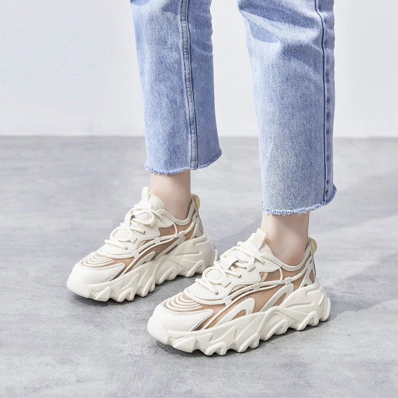 Premium white platform sneakers with thick soles, showcasing a trendy 'daddy shoe' style for comfortable and stylish everyday wear.