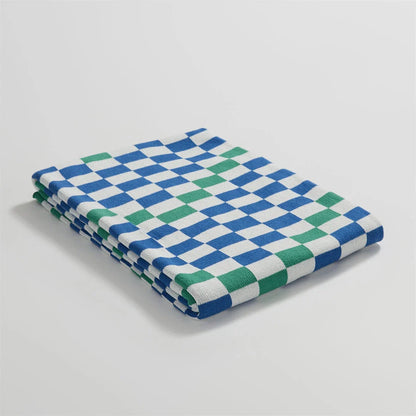Cozy and stylish plaid blanket in blue, perfect for home decor, travel, and outdoor activities