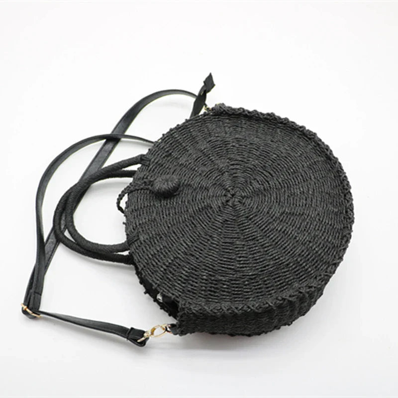Stylish round straw woven handbag with zipper closure and comfortable carrying handle