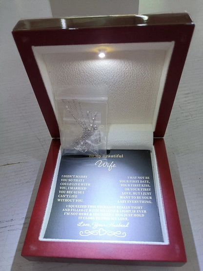 A dazzling diamond-accented star pendant necklace made of 925 sterling silver with a delicate clavicle chain, making a thoughtful holiday gift for her.