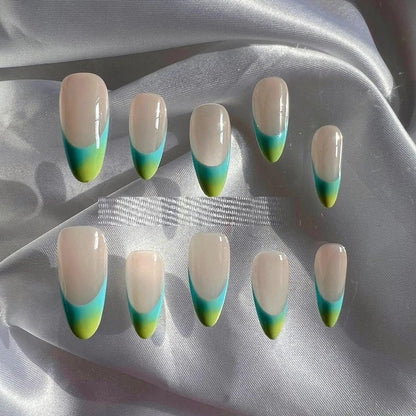Handmade premium almond-based nail armor with a French manicure design, available in custom-fitted sizes and a macaron-inspired color palette