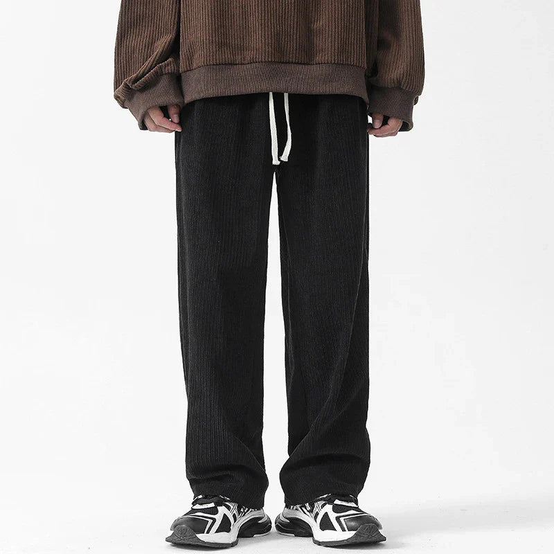 Fleece-lined corduroy pants in various colors, featuring a relaxed, straight-leg fit for all-day comfort and warmth.
