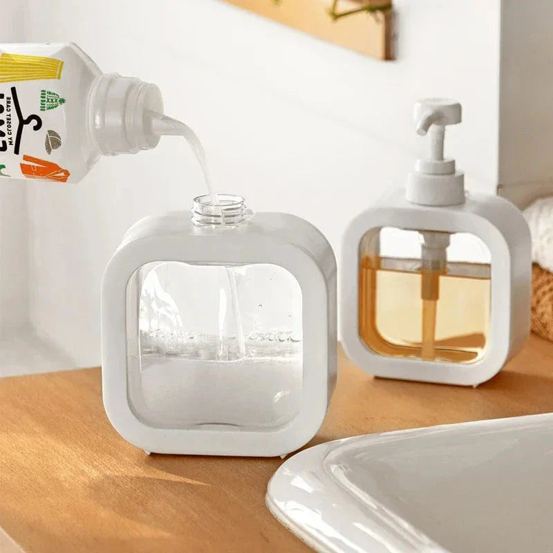 Premium 500ml refillable soap dispenser bottle with sleek white design and swivel pump head