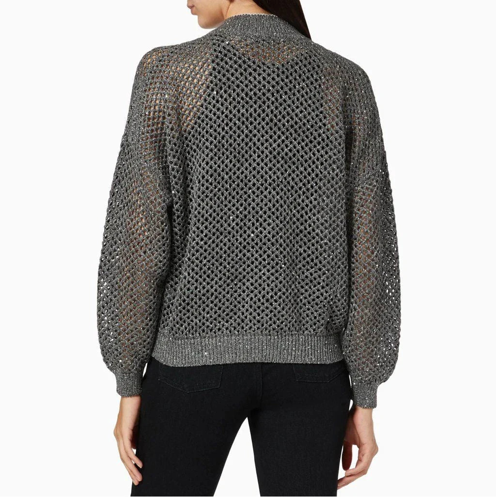 A stylish, sequin-embellished linen blend knit top with a flattering slim fit and sophisticated design.