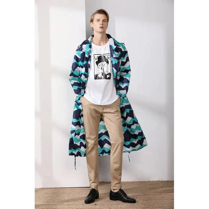 Men's long waterproof raincoat in light green color, made of high-quality Polyester Pongee fabric for durable, breathable, and weather-resistant performance.