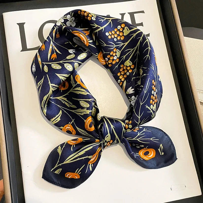 Floral print silk scarf in navy color, a versatile accessory for effortless style