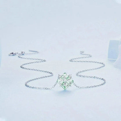 Elegant platinum-plated adjustable green pendant necklace with a sleek, silver-toned chain and a stylish green pendant