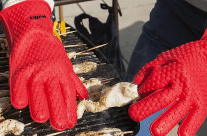 Premium heat-resistant silicone barbecue gloves in pink, designed for safe and comfortable outdoor grilling and cooking
