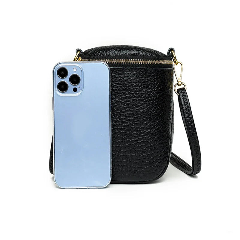 Premium leather crossbody bag with adjustable strap, multiple pockets, and sleek Korean-inspired style