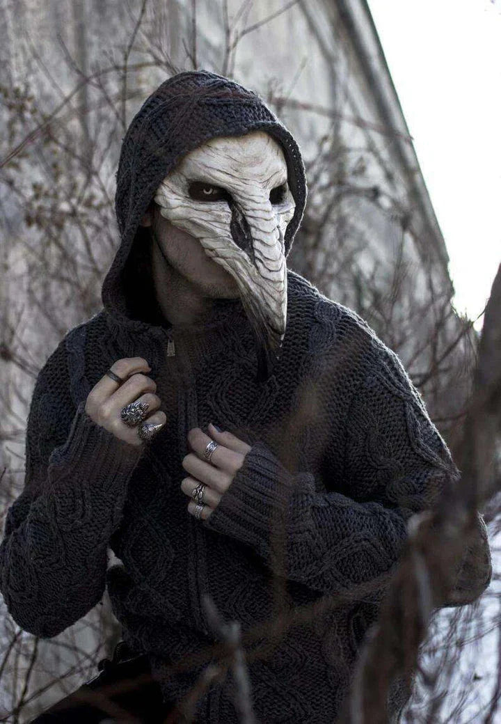 A chilling white latex plague doctor beak mask with a bone-colored finish, perfect for Halloween costumes and Gothic-inspired outfits.