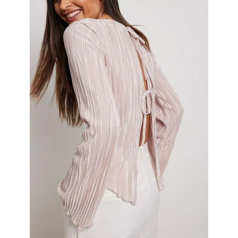 Chic pink lace-up summer bodycon blouse with delicate butterfly sleeves and pleated design