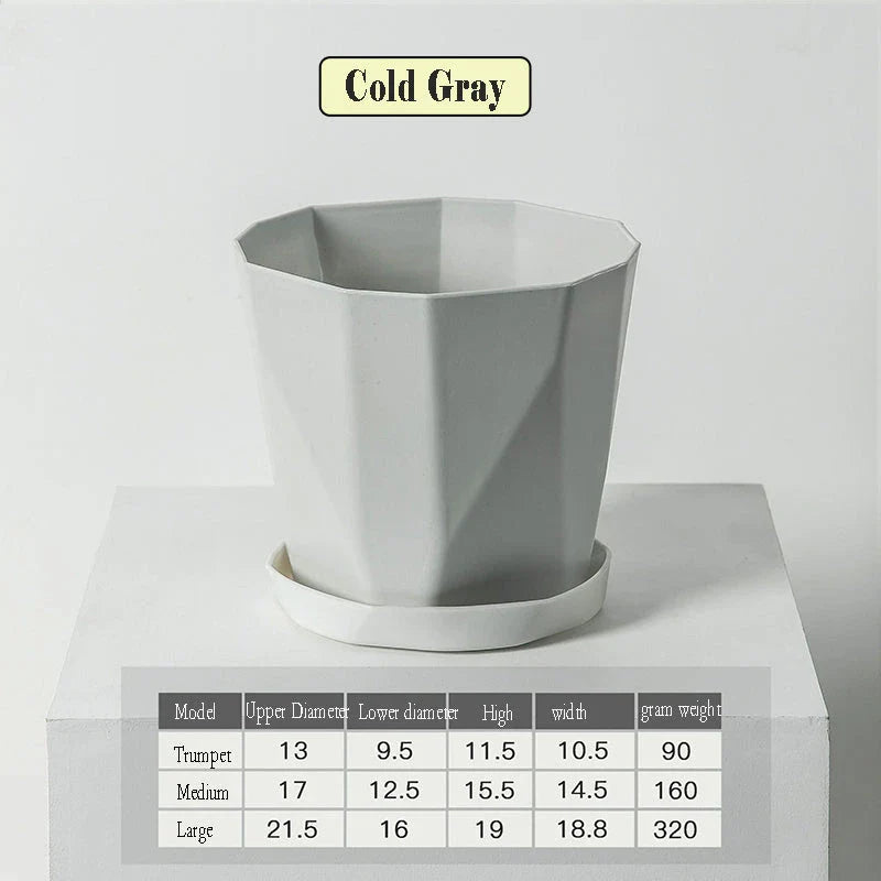 Elegant Nordic-style resin flower pot with a minimalist design, perfect for displaying indoor plants and adding a touch of Scandinavian charm to any room.