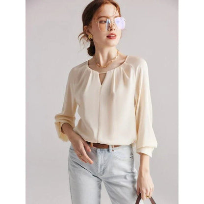 Elegant silk blend raglan sleeve blouse with timeless design and flattering fit for modern women