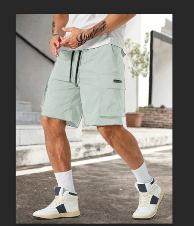 Drawstring waist men's workwear shorts with multiple pockets in various colors