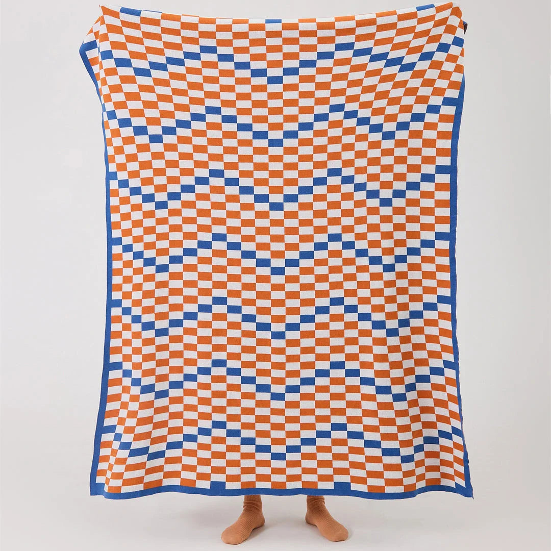 Cozy and stylish plaid blanket in blue, perfect for home decor, travel, and outdoor activities