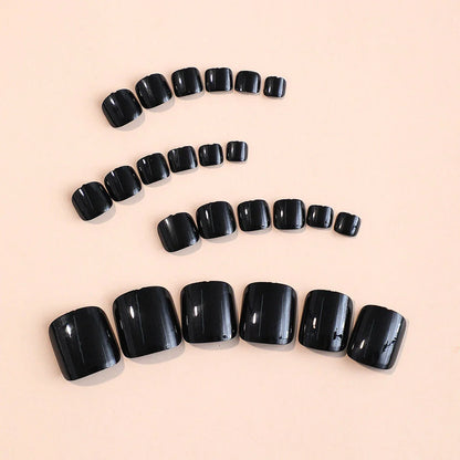 24-piece set of black glossy false toenails for a salon-quality pedicure at home