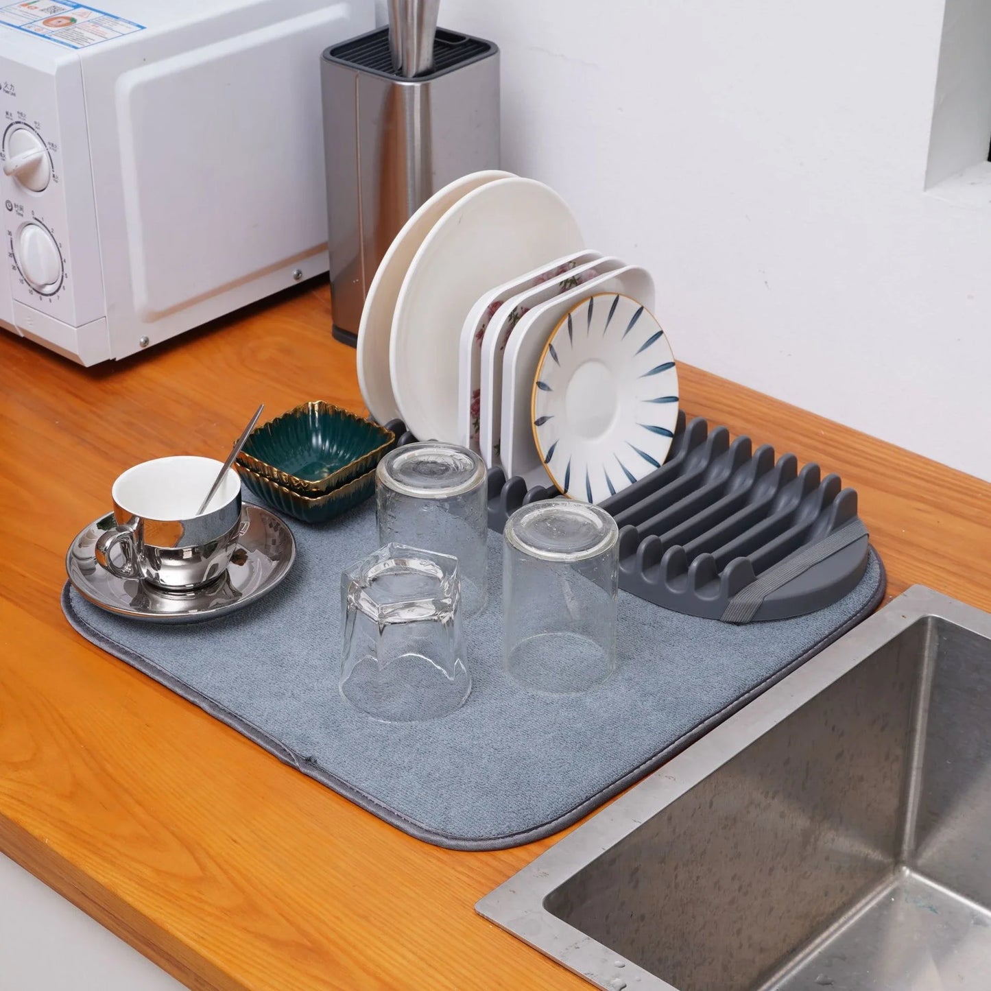 Durable dish drying rack with hanging storage hooks for organizing kitchen tools and utensils