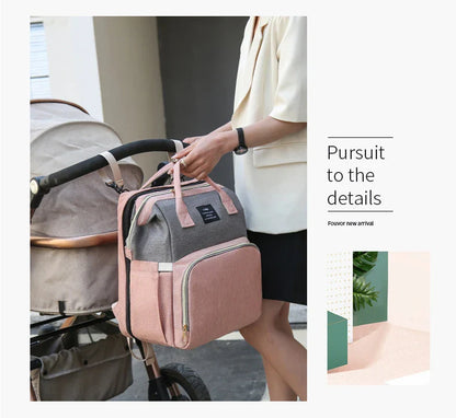 Multifunctional maternity diaper backpack with detachable crib, large capacity, and water-resistant design for travel