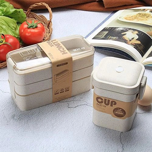 A stylish and practical 3-tier portable lunch box with separate compartments for organizing and transporting meals on the go