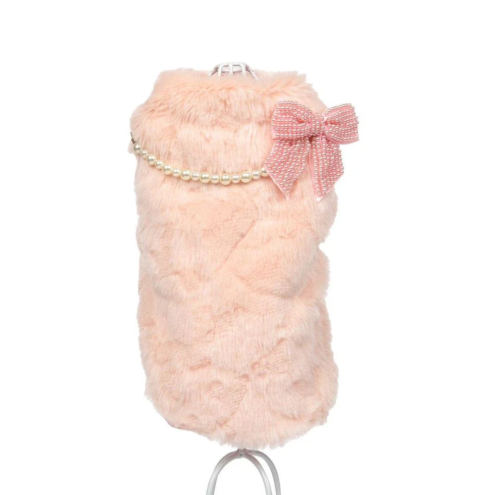 Cozy and stylish winter coat for pets, featuring a soft cotton exterior and plush faux fur lining for maximum warmth and comfort.