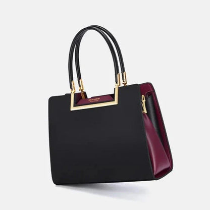 Elegant and spacious black leather tote bag with multiple compartments and a luxurious design