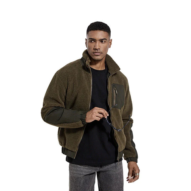 A cozy and stylish men's fleece jacket with a standing collar and convenient side pockets, available in a range of classic colors.