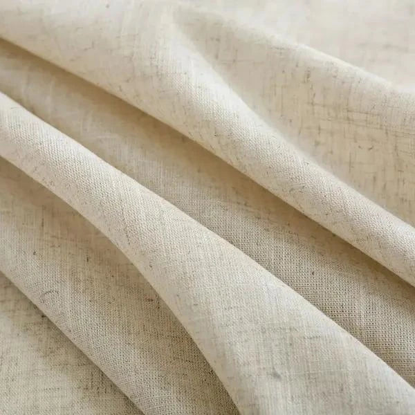 Sophisticated cotton-linen blend round tablecloth with elegant tassels, available in multiple sizes for versatile dining settings