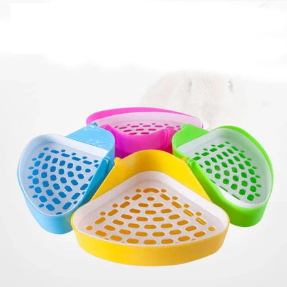 Practical Small Pet Corner Litter Box in yellow color, with dimensions of 24 x 17 x 10 cm, designed for convenient use and space-saving in homes.