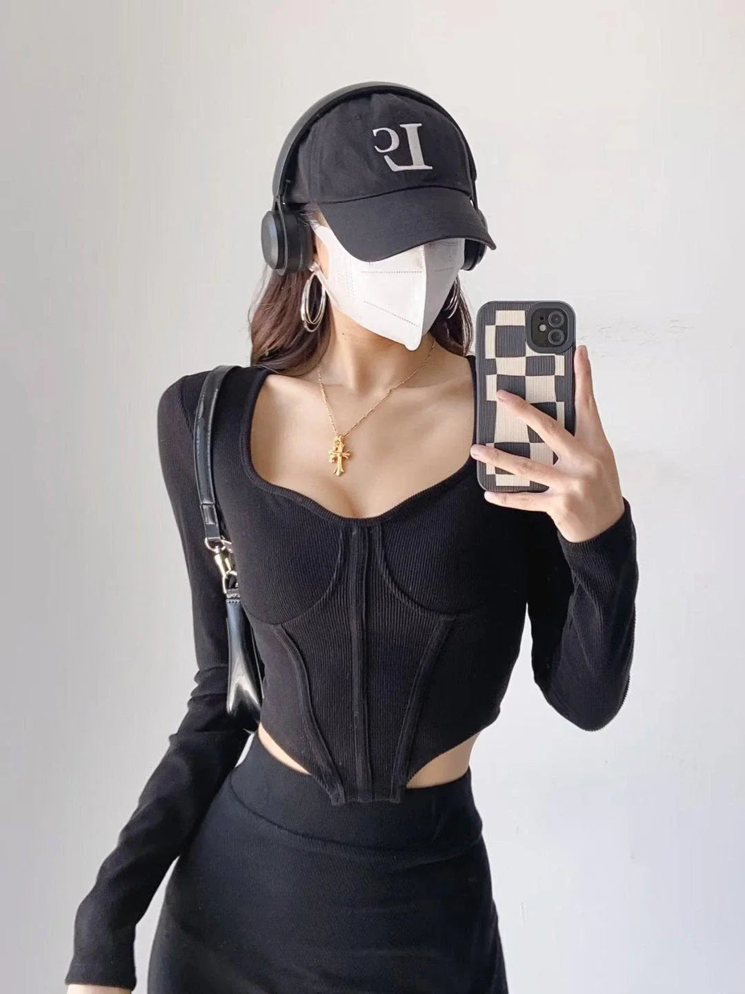 A stylish slim-fit short autumn top with an open waist design, made of premium polyester fabric with long sleeves and a square collar.