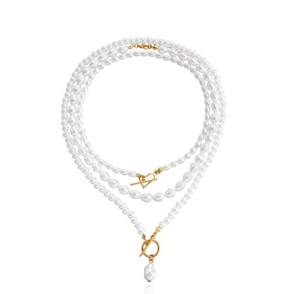 Elegant imitation pearl heart pendant necklace with lustrous bead chain and secure OT buckle closure