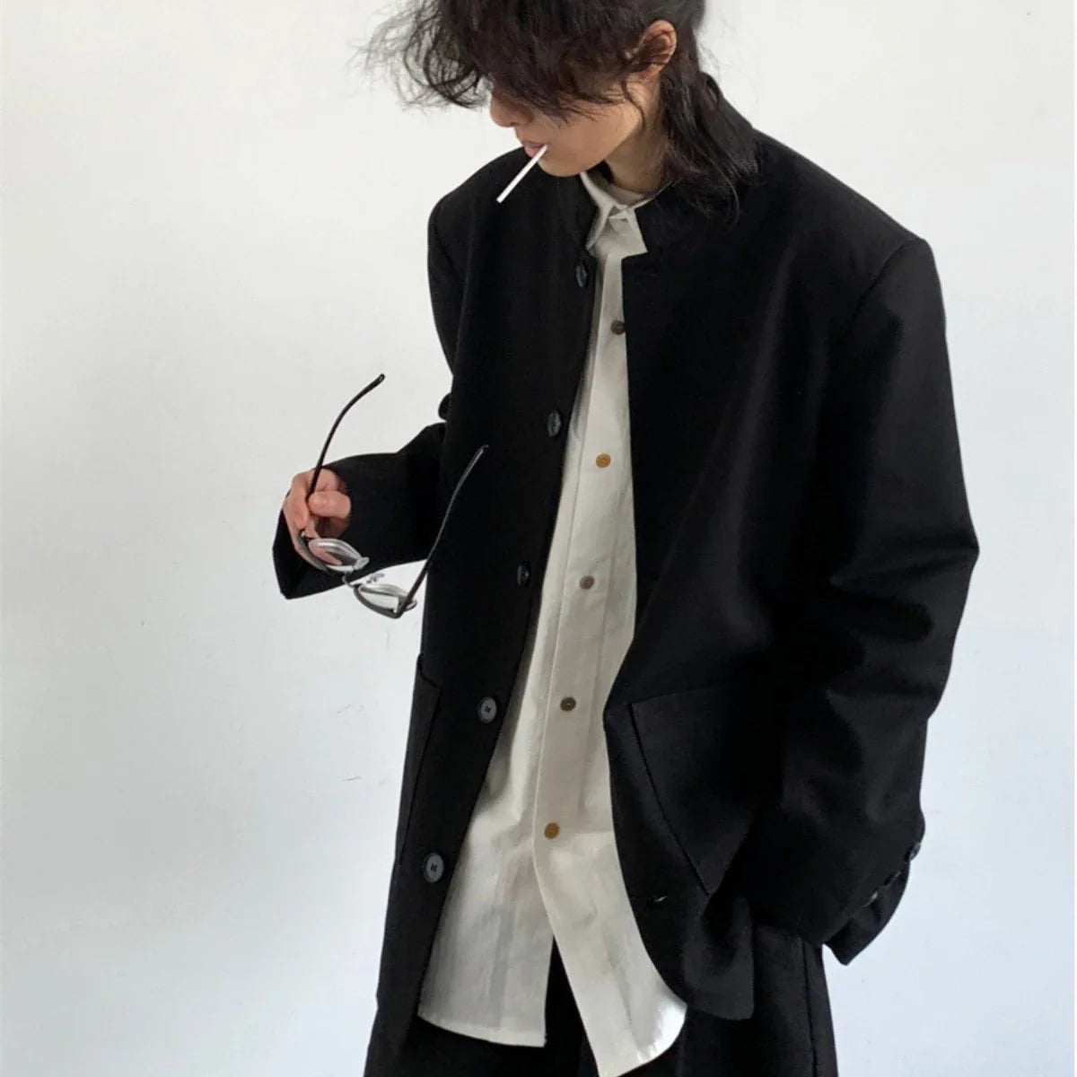 Premium casual men's Zhongshan jacket in black with stand collar design, made from durable wool blend material for sophisticated style and comfort.