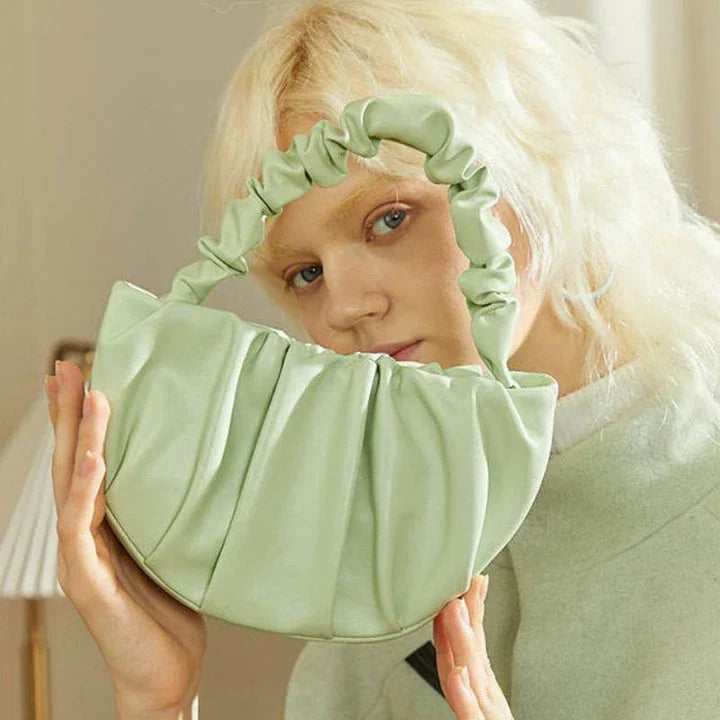 Luxurious Sheepskin Pleated Crossbody Bag in various colors - a stylish and functional everyday accessory for women