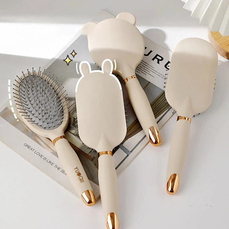 Portable heart-shaped scalp massage comb with airbag feature for curly hair and antistatic design