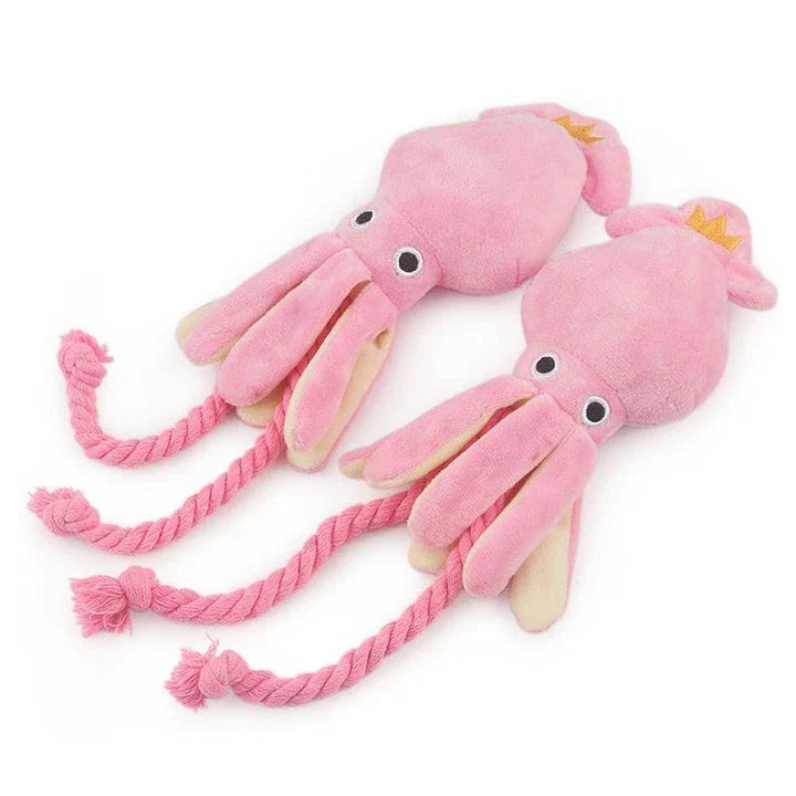 Plush pink squid-shaped dog toy made of soft, high-quality fleece material