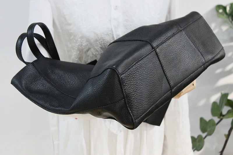 Premium leather handbag with multiple pockets and compartments for exceptional organization and style